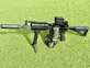 Suppressed belt-fed AR platform with red dot and bipod